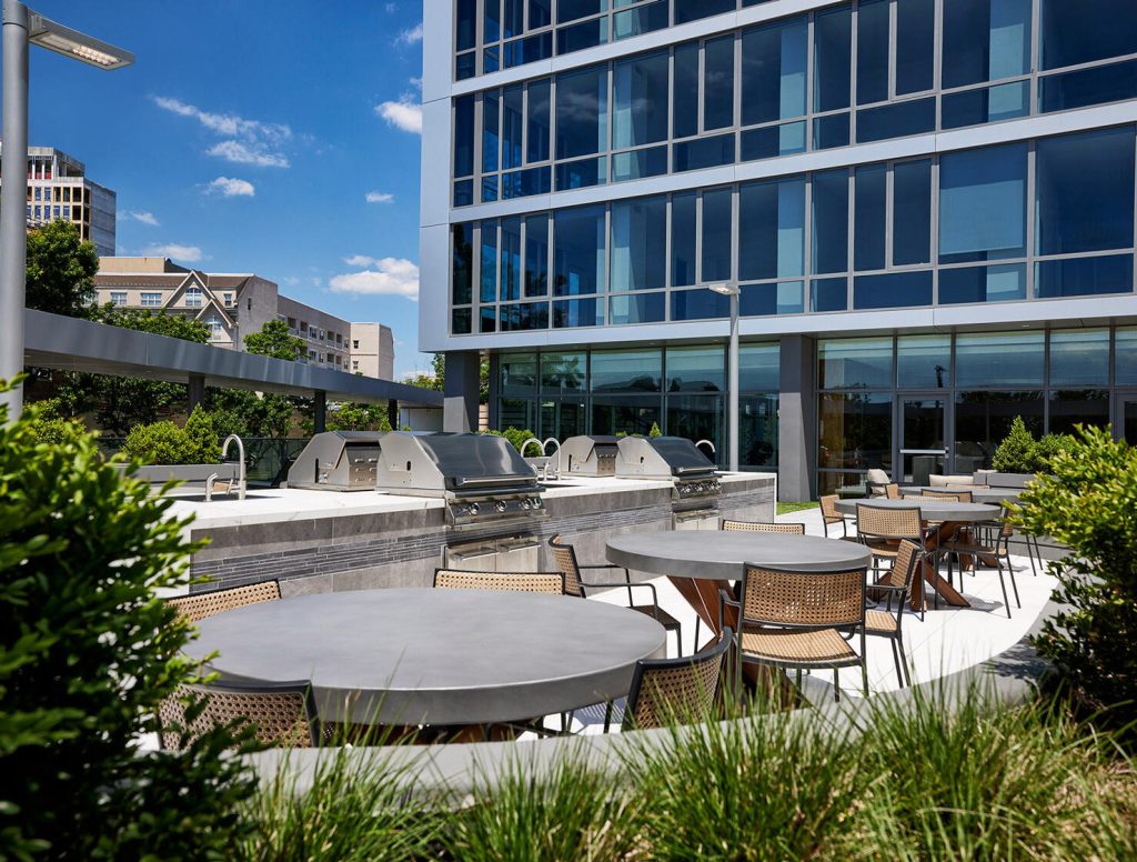 courtyard area with grills and landscaping